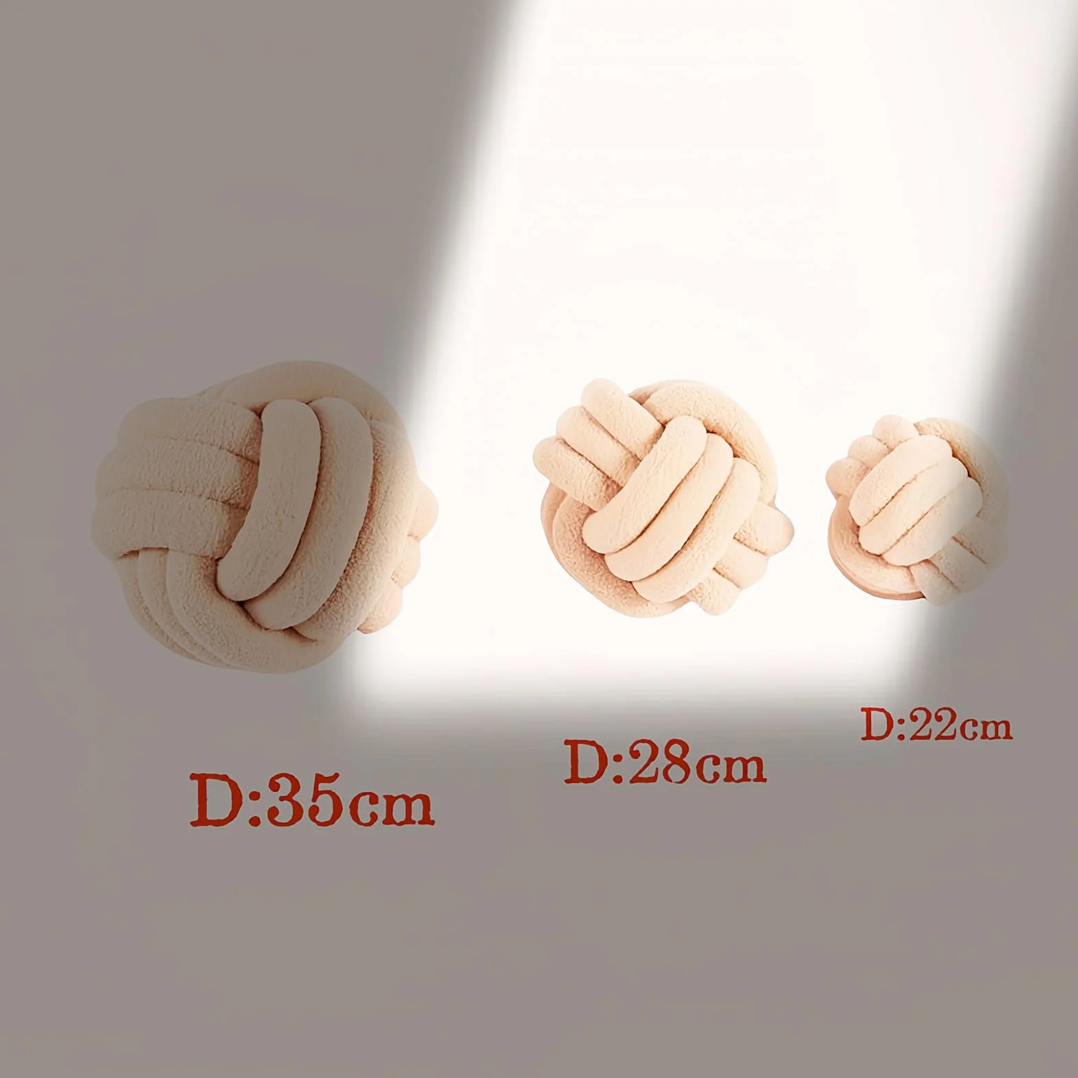 Fay Bless - Cuscino moderno a forma di nodo per la casa, morbido e rotondo, fatto a mano, per camera da letto, letto e soggiorno (Beige, 28CM)