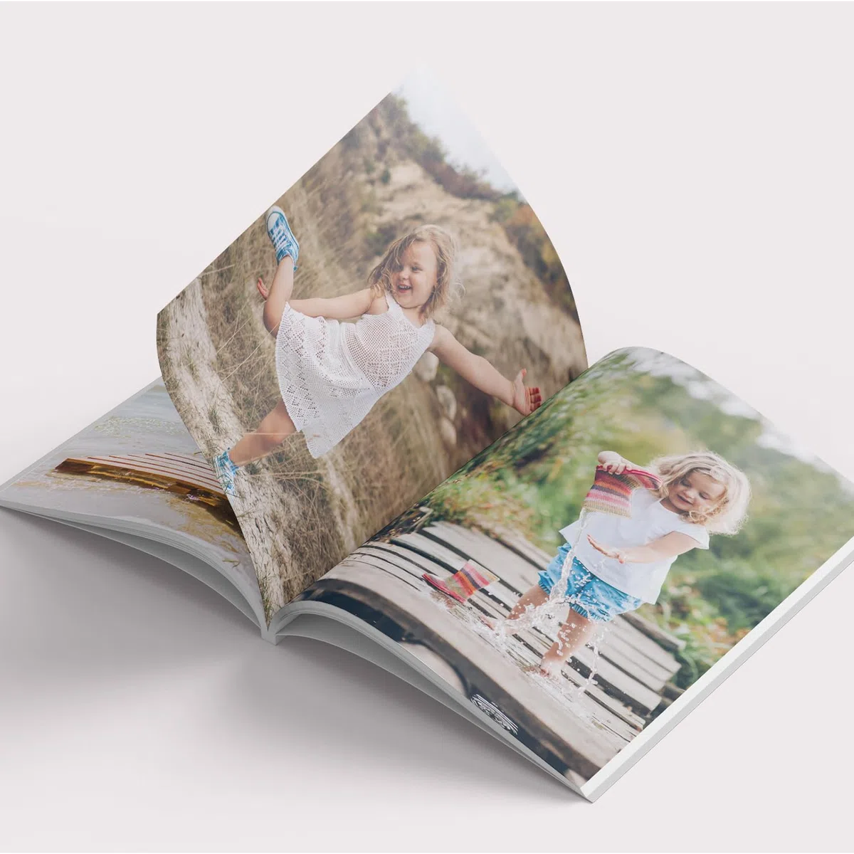 Fotolibro personalizzabile online 26 pagine quadrato, Copertina Morbida - Crea Fotolibri stampati con Foto del Battesimo, Vacanze, Natale e Compleanni